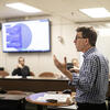 an image of a Temple University professor instructing his class