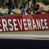 An image of the "Perserverance Conquers" wall on Temple's campus